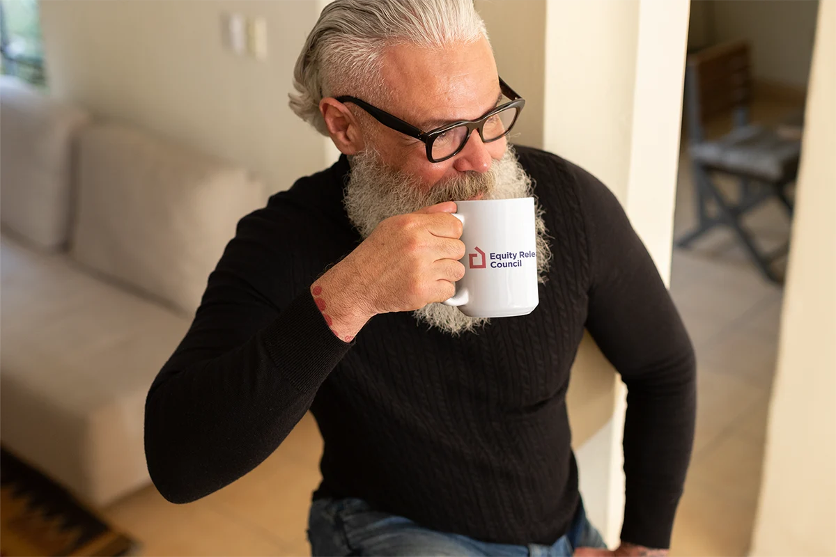 older-man-drinking-from-his-coffee-mug-23993 copy